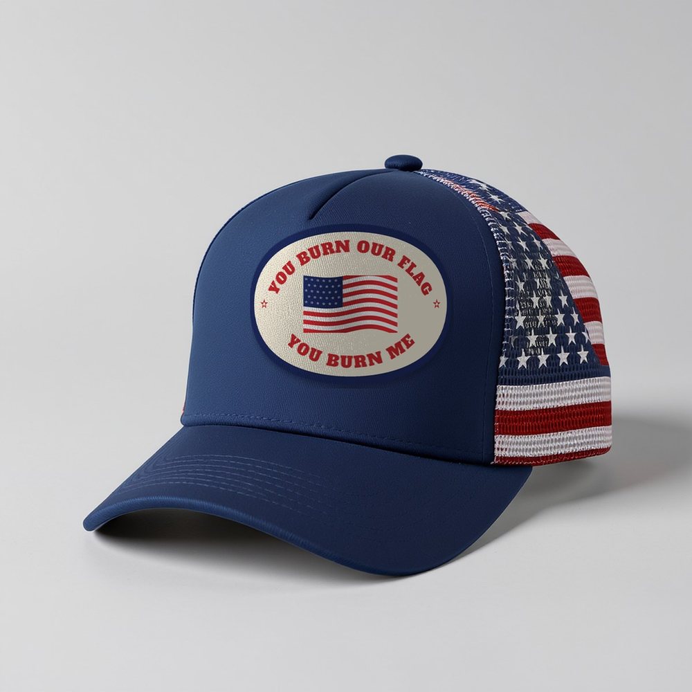 You Burn Me Flag Cap: oval patch on a navy trucker with American flag mesh